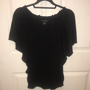 Isabella Rodriguez black blouse